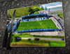 Wooden cork placemat showing Aerial Photograph of AFC Fylde - Mill Farm