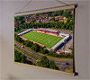A 62cm / 24.4" poster hanger with 18x24" landscape print showing Aerial Photograph of Crawley Town - Broadfield Stadium