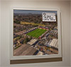 Premium Framed Cork Pin Board showing Aerial Photograph of Dagenham and Redbridge - Victoria Road