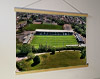 A 62cm / 24.4" poster hanger with 18x24" landscape print showing Aerial Photograph of Forest Green Rovers - The New Lawn