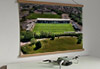 A 62cm / 24.4" poster hanger with 18x24" landscape print showing Aerial Photograph of Forest Green Rovers - The New Lawn