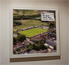 Premium Framed Cork Pin Board showing Aerial Photograph of Lewes FC - Dripping Pan