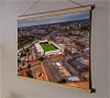 A 62cm / 24.4" poster hanger with 18x24" landscape print showing Aerial Photograph of Nottingham Forest - The City Ground